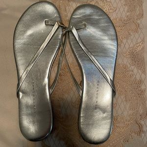 Silver Laura Conrad flip flops